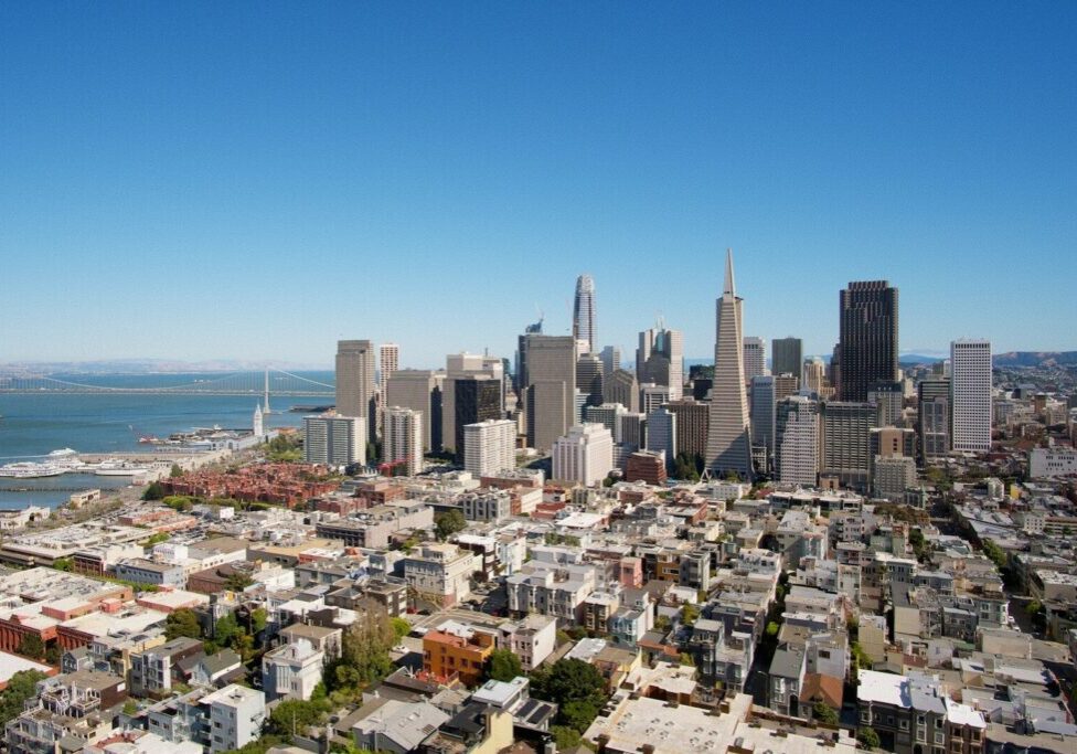city buildings under blue sky during daytime